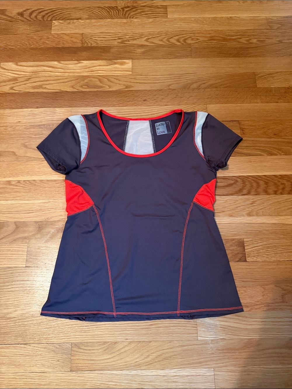 Lucky in Love brown Tee with Red Trim and Mesh Panels